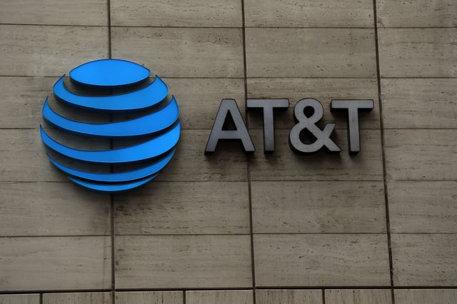 The logo of AT&amp;T outside of AT&amp;T corporate headquarters on March 13, 2020 in Dallas, Texas.
