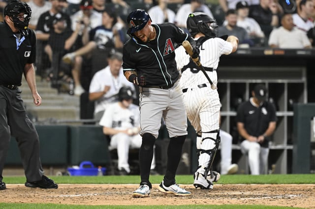 Jun 23, 2025; Chicago, Illinois, USA;  Arizona Diamondbacks second base Ildemaro Vargas (6) reacts after striking out swinging against the Chicago White Sox during the sixth inning at Rate Field. Mandatory Credit: Matt Marton-Imagn Images