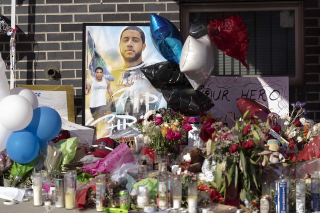 FILE - Items fill a memorial for Temple University Police Officer Christopher Fitzgerald, Feb. 23, 2023, in Philadelphia. (AP Photo/Matt Rourke, File)