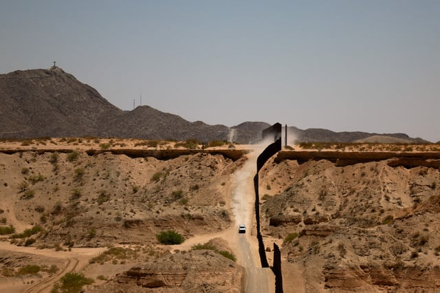 A U.S. Border Patrol vehicle patrols along the border wall, following the establishment of a 260-mile military zone along the southern U.S. border in New Mexico and Texas as part of the Trump administration's crackdown on immigration, in Sunland Park, New Mexico, U.S., May 20, 2025. REUTERS/Jose Luis Gonzalez/File Photo