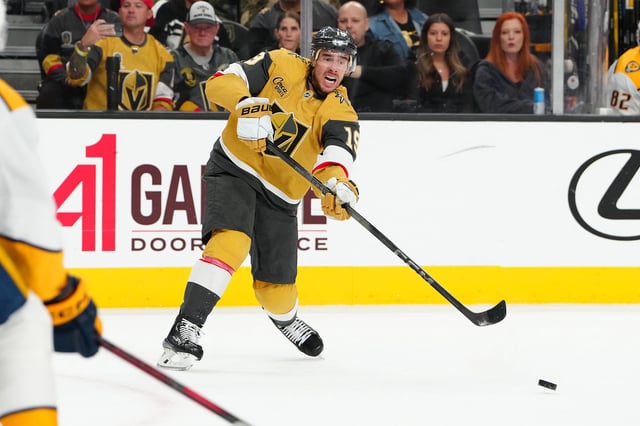 Apr 12, 2025; Las Vegas, Nevada, USA; Vegas Golden Knights right wing Reilly Smith (19) makes a pass during a power play against the Nashville Predators in the first period at T-Mobile Arena. Mandatory Credit: Stephen R. Sylvanie-Imagn Images/File Photo
