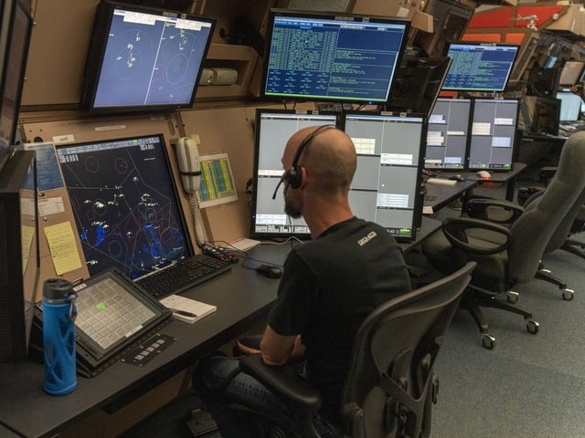 An air traffic controller works in the operations centre at Edmonton International Airport on Wednesday, June 25, 2025. Groundbreaking technology will be deployed in the next five years in the centre which will deliver substantial benefits to the aviation industry. 