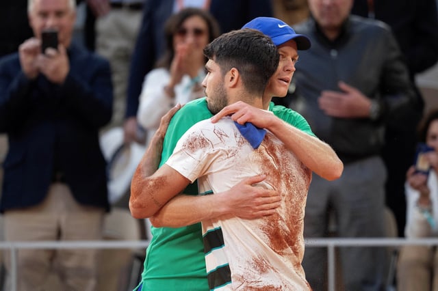 Jun 8, 2025; Paris, FR;  Carlos Alcaraz of Spain and Jannik Sinner of Italy after the men’s singles final match on day 15 at Roland Garros Stadium.  Mandatory Credit: Susan Mullane-Imagn Images/File Photo