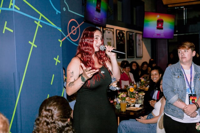 Lexi Goldberg, a star of Season 1 of the Netflix reality dating series “The Ultimatum: Queer Love,” introduces the premiere of Season 2 at Rikki’s sports bar in San Francisco on Tuesday, June 24.