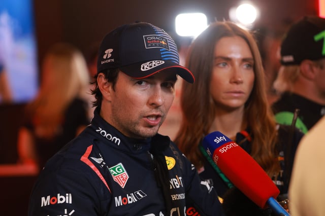 Sergio Perez of Mexico and Oracle Red Bull Racing answers questions in the TV media pen during qualifying ahead of the F1 Grand Prix of Abu Dhabi at Yas Marina Circuit on December 7, 2024 in Abu Dhabi, United Arab Emirates.