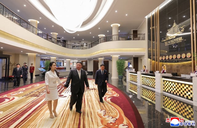 North Korean leader Kim Jong Un and his daughter Kim Ju Ae walk inside a hotel during a ceremony to celebrate the completion of the Wonsan Kalma Coastal Tourist Zone, in Wonsan, in North Korea, June 24, 2025.  KCNA via REUTERS    ATTENTION EDITORS - THIS IMAGE WAS PROVIDED BY A THIRD PARTY. REUTERS IS UNABLE TO INDEPENDENTLY VERIFY THIS IMAGE. NO THIRD PARTY SALES. SOUTH KOREA OUT. NO COMMERCIAL OR EDITORIAL SALES IN SOUTH KOREA.