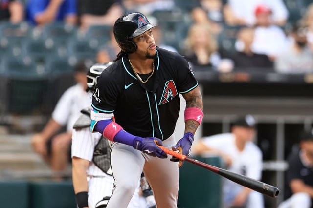 Ketel Marte #4 of the Arizona Diamondbacks watches his solo home run during the first inning against the Chicago White Sox at Rate Field, in Chicago, on June 24, 2025.