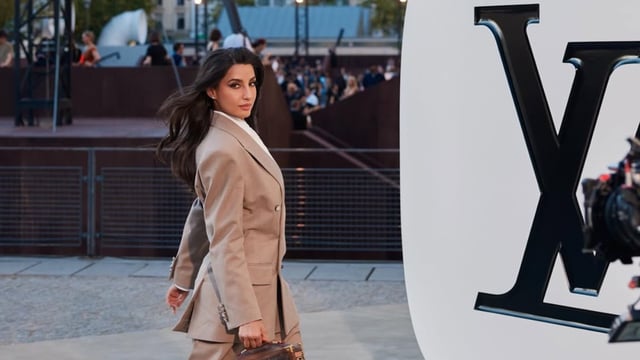 Nora Fatehi wears a formal suit to Louis Vuitton show