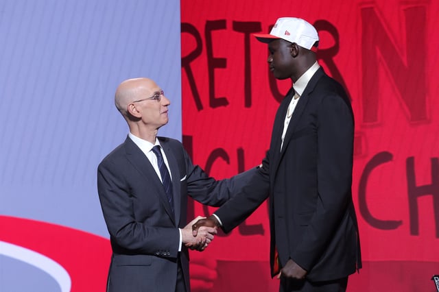 Jun 25, 2025; Brooklyn, NY, USA;  Khaman Maluach stands with NBA commissioner Adam Silver after being selected as the tenth pick by the Houston Rockets in the first round of the 2025 NBA Draft at Barclays Center. Mandatory Credit: Brad Penner-Imagn Images