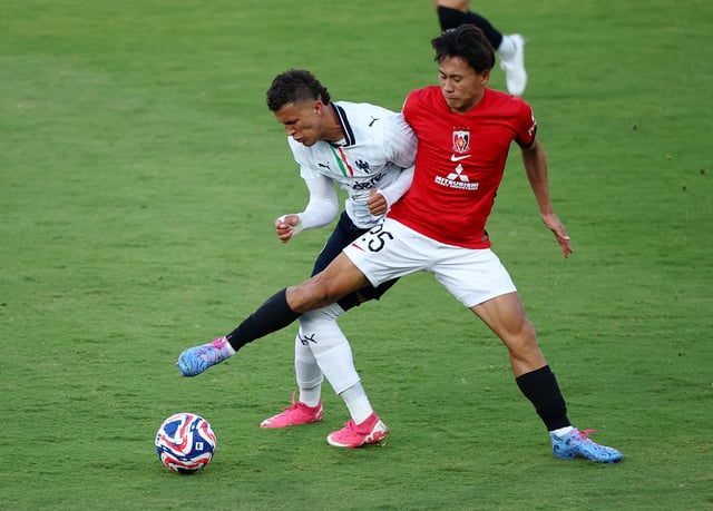 Soccer Football - FIFA Club World Cup - Group E - Urawa Red Diamonds v CF Monterrey - Rose Bowl, Pasadena, California, U.S. - June 25, 2025 CF Monterrey's Nelson Deossa in action with Urawa Red Diamonds' Kaito Yasui REUTERS/Daniel Cole