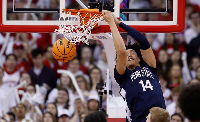 Penn State center Yanic Konan Niederhauser scores on a reverse dunk during the second half of a game against Wisconsin on March 8, 2025, in Madison, Wisc. The Clippers selected the 6-foot-11 Niederhauser with the final pick of the first round of the NBA draft on Wednesday night, 30th overall. (Photo by John Fisher/Getty Images)