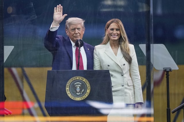 President Donald Trump and first lady Melania Trump attend a military parade commemorating the Army&#39;s 250th anniversary, coinciding with his 79th birthday, Saturday, June 14, 2025, in Washington. (AP Photo/Julia Demaree Nikhinson)