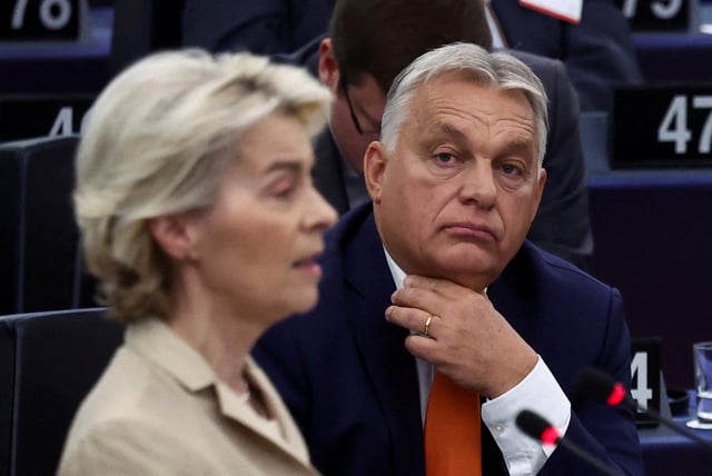 Hungary's Prime Minister Viktor Orban looks on as European Commission president Ursula von der Leyen speaks at the European Parliament, in Strasbourg, France October 9, 2024. REUTERS/Yves Herman/File Photo