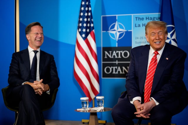 President Donald Trump (R) and NATO Secretary General Mark Rutte speak to media at the start of the second day of the 2025 NATO Summit on June 25, 2025 in The Hague, Netherlands.