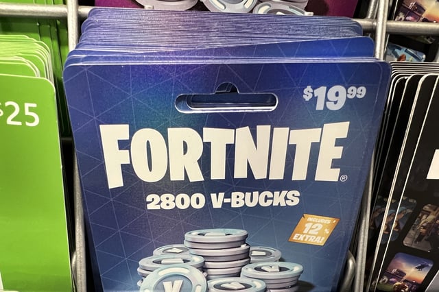 Fortnite V-Bucks are offered for sale at a video game retailer on December 19, 2022 in Chicago, Illinois.