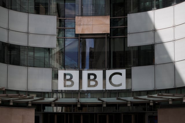 The BBC logo is displayed above the entrance to the BBC headquarters in London, Britain, July 10, 2023. REUTERS/Hollie Adams/File Photo