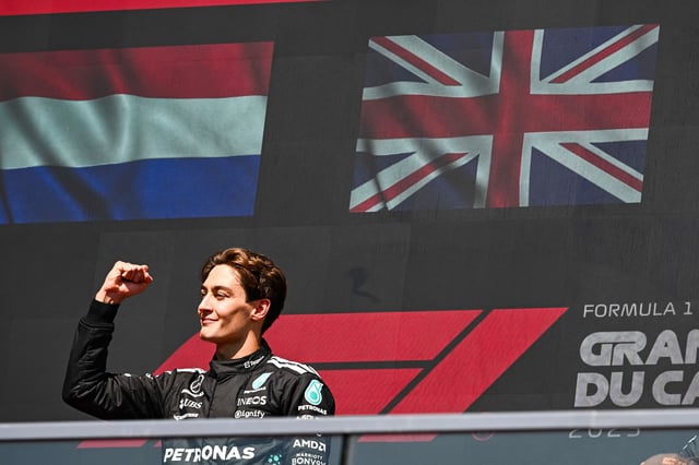 Jun 15, 2025; Montreal, Quebec, Canada; Winner of the F1 Canadian Grand Prix Mercedes driver George Russell (63) reacts before receiving his trophy at Circuit Gilles-Villeneuve. Mandatory Credit: David Kirouac-Imagn Images/File Photo