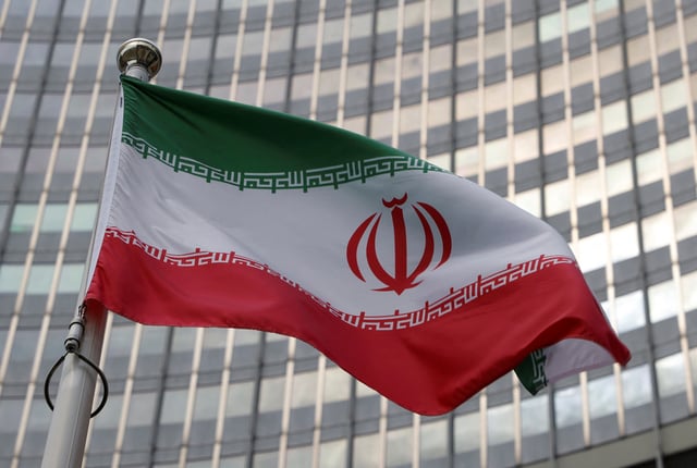 The Iranian flag flutters in front of the International Atomic Energy Agency (IAEA) organisation's headquarters in Vienna, Austria, June 5, 2023. REUTERS/Leonhard Foeger/ File Photo