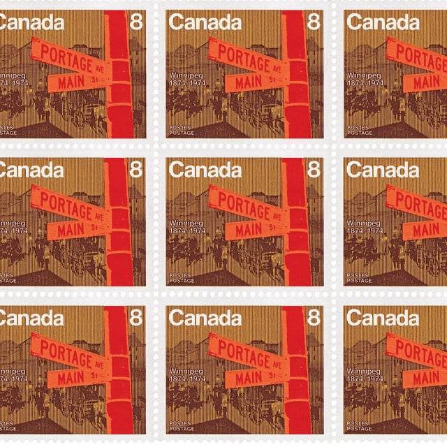 The intersection of Portage Ave. and Main St. as featured on this Canadian postage stamp issued in 1974 to commemorate the city of Winnipeg's centennial year.