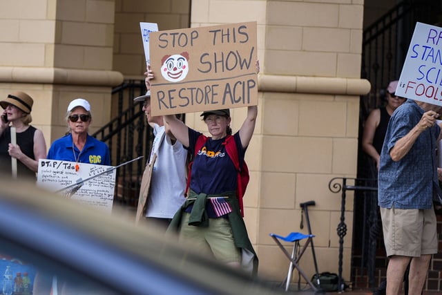 Demonstrators rally for support of the CDC during a meeting of the Advisory Committee in Immunization Practices, Wednesday, June 25, 2025, in Atlanta. (AP Photo/Mike Stewart)