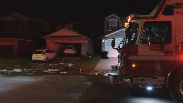 Calgary fire officials investigate a fatal house fire in the northeast community of Taradale, Alta., on June 26, 2025.