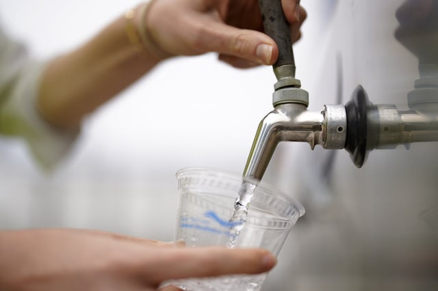 File photo: a cup being filled from a drinking water tap.