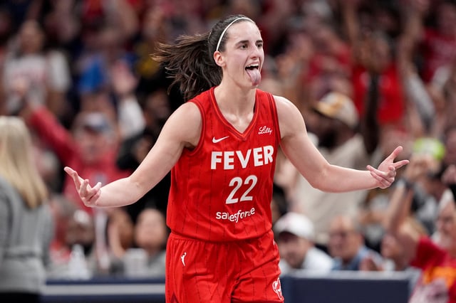 Caitlin Clark #22 of the Indiana Fever celebrates a basket during the second half of a game against the Las Vegas Aces at Gainbridge Fieldhouse. Clark will now miss a game with another leg injury.