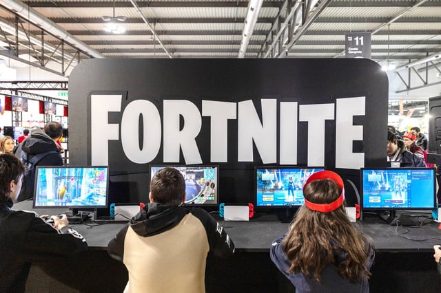 Fairgoers play video games at the Japanese publisher Nintendo Switch's stand during Milan Games Week & Cartoomics 2024 at Fiera Milano Rho on November 22, 2024 in Milan, Italy. 