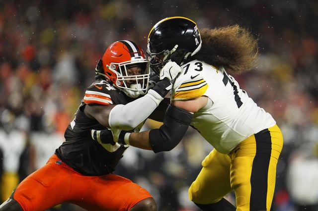 CLEVELAND, OH - NOVEMBER 21: Ogbo Okoronkwo #54 of the Cleveland Browns rushes the passer during an NFL football game against the Pittsburgh Steelers at Huntington Bank Field on November 21, 2024 in Cleveland, Ohio.