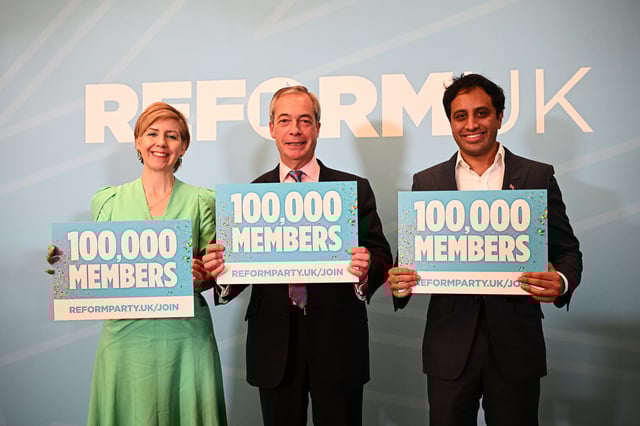 LONDON, ENGLAND - NOVEMBER 28: Leader of Reform UK, Nigel Farage (C), Chairman of Reform UK Zia Yusuf (R) and new Reform UK party member and former Tory MP Andrea Jenkyns (L) seen while attending a Reform UK press conference on November 28, 2024 in London, England. The populist Reform UK party called a press conference to make a statement on party growth and professionalization. (Photo by Leon Neal/Getty Images)