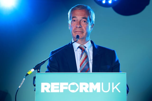 PADDOCK WOOD, ENGLAND - MAY 02: Leader of Reform UK Nigel Farage addresses supporters and the media as Reform UK celebrate historic local election victories on May 02, 2025 in Paddock Wood, England. The Reform Party won the Runcorn by-election by a slim margin of six votes, taking the safe seat from Labour. They are picking up council seats across England from the Conservatives and Labour, and have installed a new Mayor in Greater Lincolnshire in last night&#39;s local elections. (Photo by Lia Toby/Getty Images)