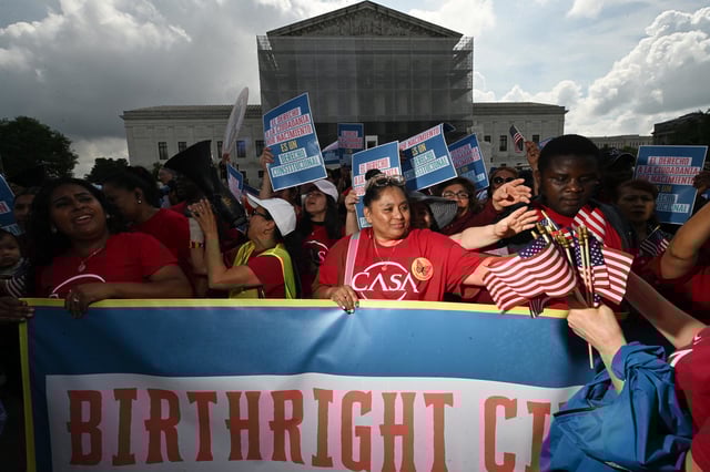 Demonstrators rally outside the Supreme Court in support of birthright citizenship on May 15, 2025.