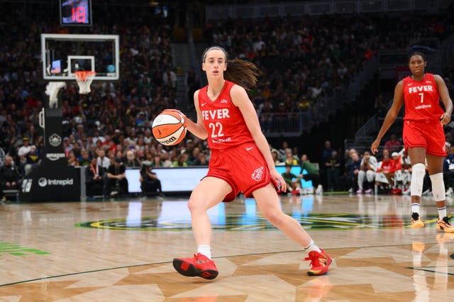 Jun 24, 2025; Seattle, Washington, USA; Indiana Fever guard Caitlin Clark (22) dribbles the ball against the Seattle Storm during the second half at Climate Pledge Arena. Mandatory Credit: Steven Bisig-Imagn Images/File Photo
