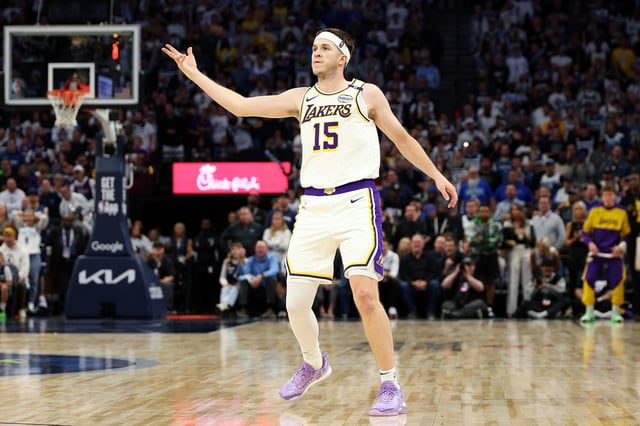 Austin Reaves #15 of the Los Angeles Lakers celebrates his three-point basket against the Minnesota Timberwolves in the fourth quarter of Game Four of the First Round of the 2025 NBA Playoffs at Target Center on April 27, 2025 in Minneapolis, Minnesota. The Timberwolves defeated the Lakers 116-113 to take a 3-1 series lead.