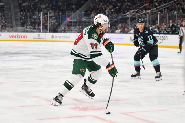 Mar 4, 2025; Seattle, Washington, USA; Minnesota Wild center Frederick Gaudreau (89) shoots the puck against the Seattle Kraken during the second period at Climate Pledge Arena. Mandatory Credit: Steven Bisig-Imagn Images/File Photo