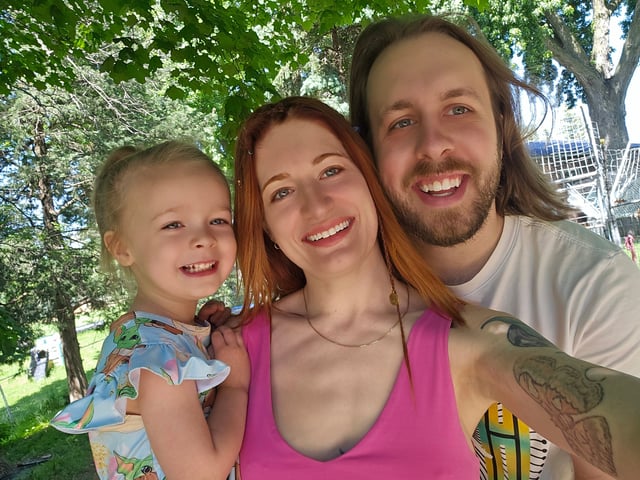 Mikayla Raines, center, with her husband Ethan Frankamp, right, and daughter Freya Frankamp.