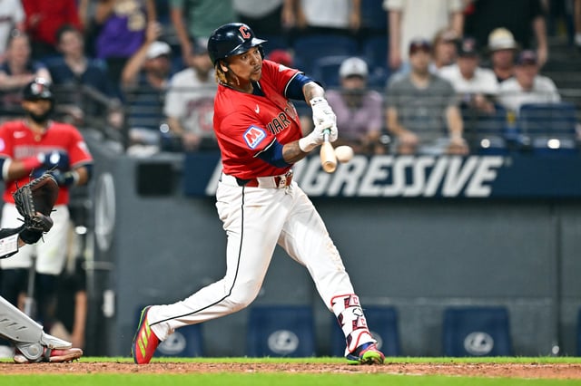 CLEVELAND, OHIO - JUNE 25: José Ramírez #11 of the Cleveland Guardians hits a walk-off single during the tenth inning against the Toronto Blue Jays at Progressive Field on June 25, 2025 in Cleveland, Ohio. The Guardians defeated the Blue Jays 5-4 in 10 innings.
