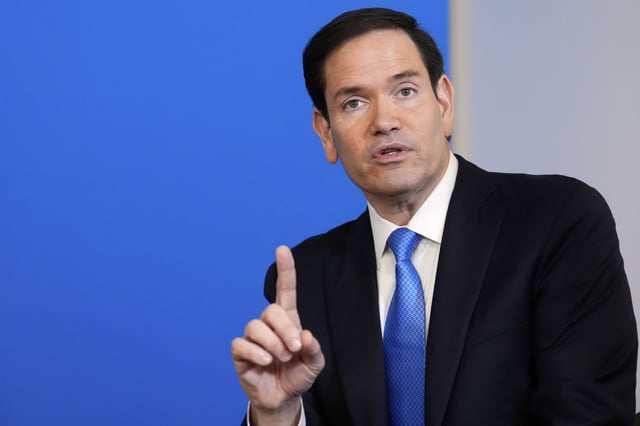 Secretary of State Marco Rubio points during a meeting of President Donald Trump and NATO Secretary General Mark Rutte at the NATO summit in The Hague, Netherlands, Wednesday, June 25, 2025.