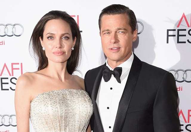 HOLLYWOOD, CA - NOVEMBER 05:  Writer-director-producer-actress Angelina Jolie Pitt (L) and actor-producer Brad Pitt attend the opening night gala premiere of Universal Pictures&#39; &#34;By the Sea&#34; during AFI FEST 2015 presented by Audi at TCL Chinese 6 Theatres on November 5, 2015 in Hollywood, California.  (Photo by Jason Merritt/Getty Images)