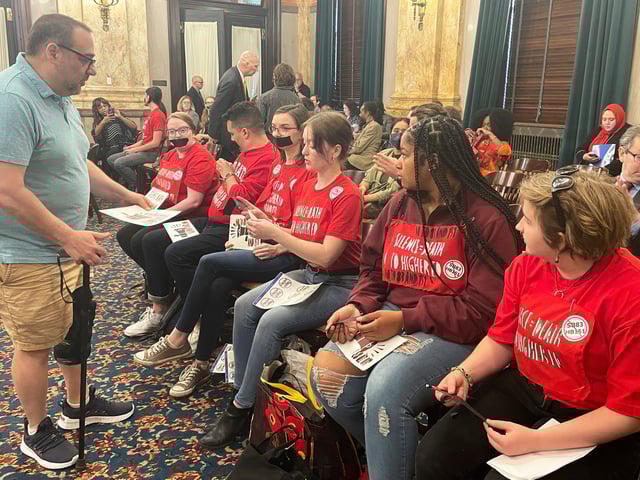 FILE - Opponents of a multifaceted higher education bill protest across the Ohio Statehouse in Columbus, Ohio, May 17, 2023. (AP Photo/Samantha Hendrickson, File)