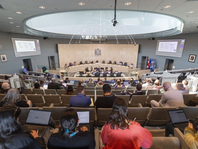 Edmonton residents and business leaders sit in Edmonton city hall council chambers to speak on the controversial extension of the community revitalization levy and its accompanying projects on Thursday, June 26, 2025, in Edmonton. 
