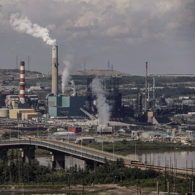 Suncor's base plant with upgraders in the oil sands in Fort McMurray Alta, on Monday June 13, 2017. THE CANADIAN PRESS/Jason Franson