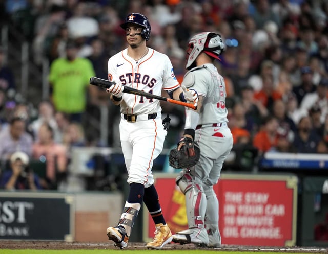 Houston Astros&#39; Mauricio Dubon (14) reacts after striking out against Philadelphia Phillies starting pitcher Cristopher Sanchez during the second inning of a baseball game, Thursday, June 26, 2025, in Houston. (AP Photo/Karen Warren)