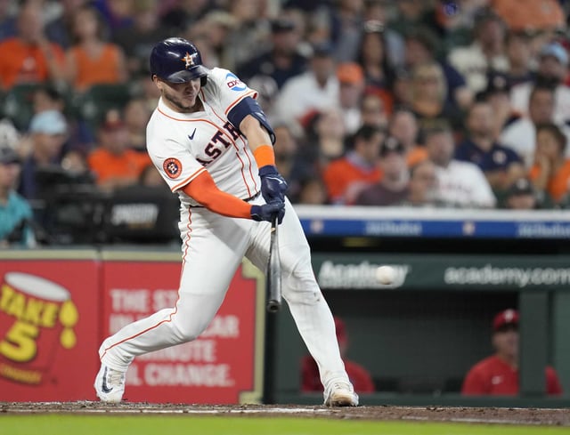 Houston Astros&#39; Yainer Diaz hits a single off of Philadelphia Phillies starting pitcher Cristopher Sanchez during the second inning of a baseball game, Thursday, June 26, 2025, in Houston. (AP Photo/Karen Warren)