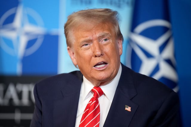 President Donald Trump can be seen speaking to media at the start of the second day of the 2025 NATO Summit on June 25, 2025, in The Hague, Netherlands. (Photo by Andrew Harnik/Getty Images)