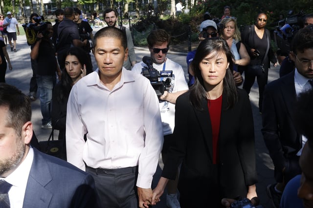 FILE - Former New York Governor Kathy Hochul aide Linda Sun, right, and her husband, Christopher Hu, leave Brooklyn Federal Court after their arraignment, Sept. 3, 2024, in New York. (AP Photo/Corey Sipkin, File)