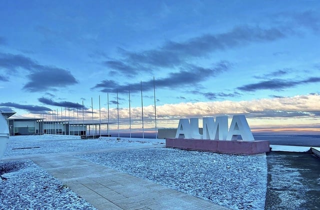 This handout picture released by the ALMA Observatory in the Atacama Desert shows snowfall at dawn, a phenomenon that had not occurred in 10 years at this altitude in the driest desert in the world
