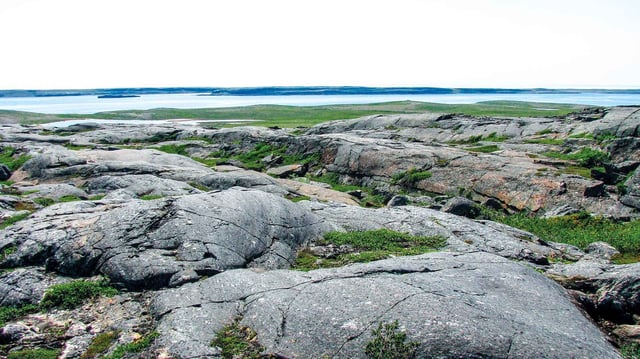 A south-facing view from the Nuvvuagittuq Greenstone Belt in northern Quebec, where exposed rock formations are believed to date back as far as 4.3 billion years. These ancient outcrops, among the oldest on Earth, offer rare geological evidence from the Hadean eon. (Photo: Jonathan O’Neil)