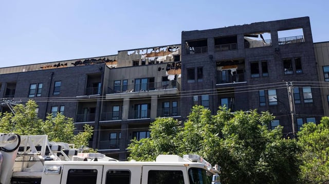 The fire-damaged portion of The Cooper apartments in Near Southside Fort Worth on Tuesday, June 24.