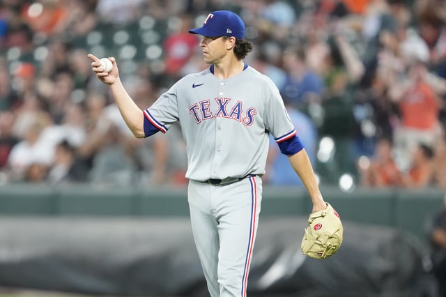 BALTIMORE, MD - JUNE 25: Jacob deGrom #48 of the Texas Rangers gestures in the eighth inning after his no-hit bid is broken during a game against the Baltimore Orioles at Oriole Park at Camden Yards on June 24, 2025 in Baltimore, Maryland.